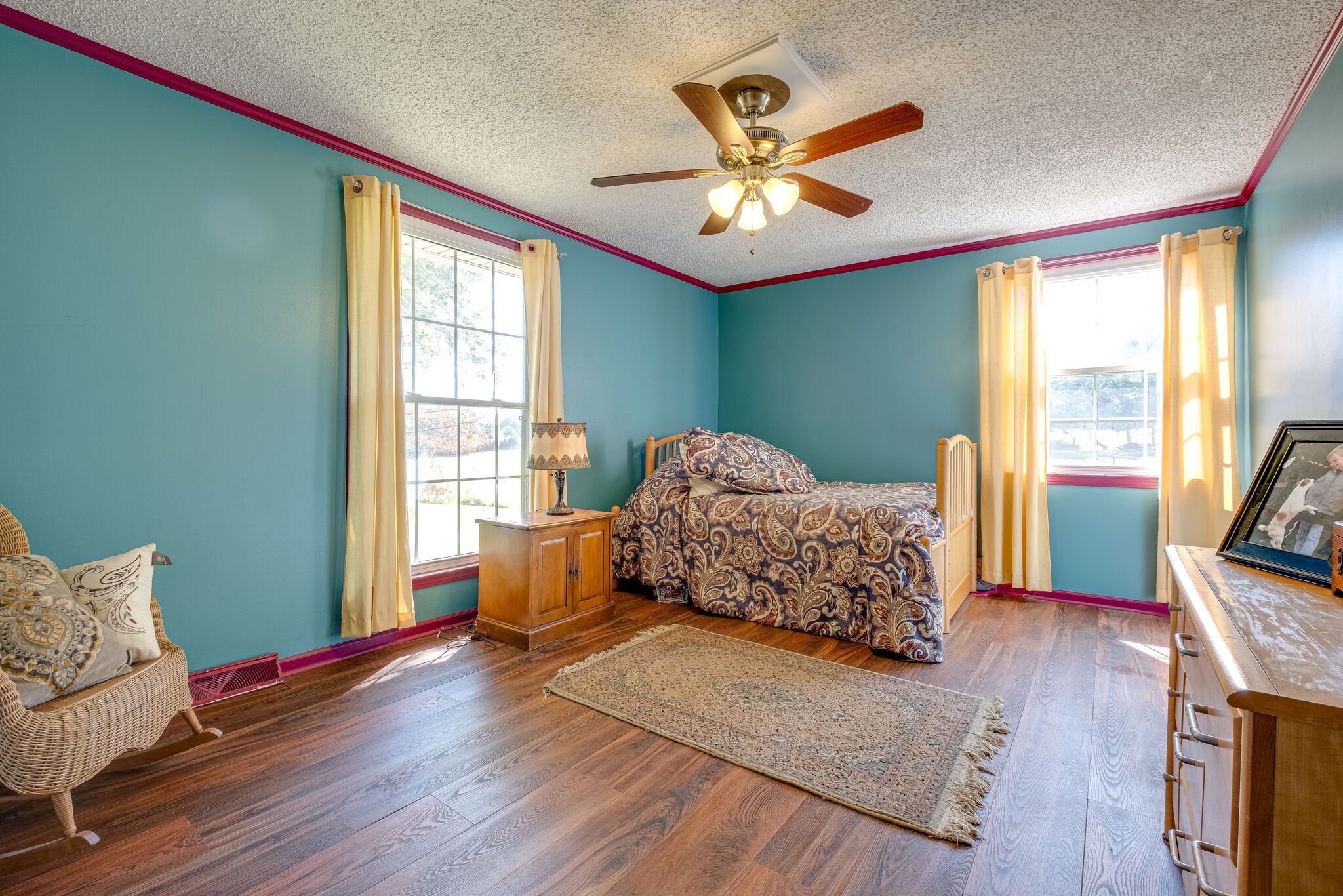 5025 Hickory Ridge Road Lebanon, TN 37087 - Photo 24 of 52 a bedroom with a bed and wooden floor