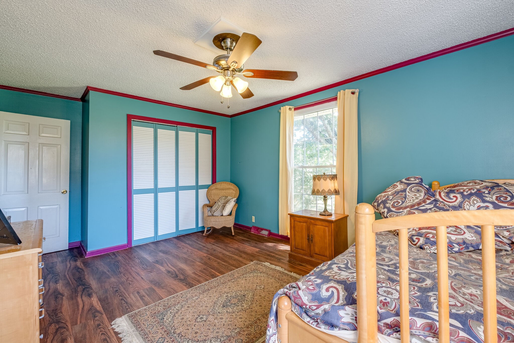 5025 Hickory Ridge Road Lebanon, TN 37087 - Photo 25 of 52 a bedroom with a bed and wooden floor