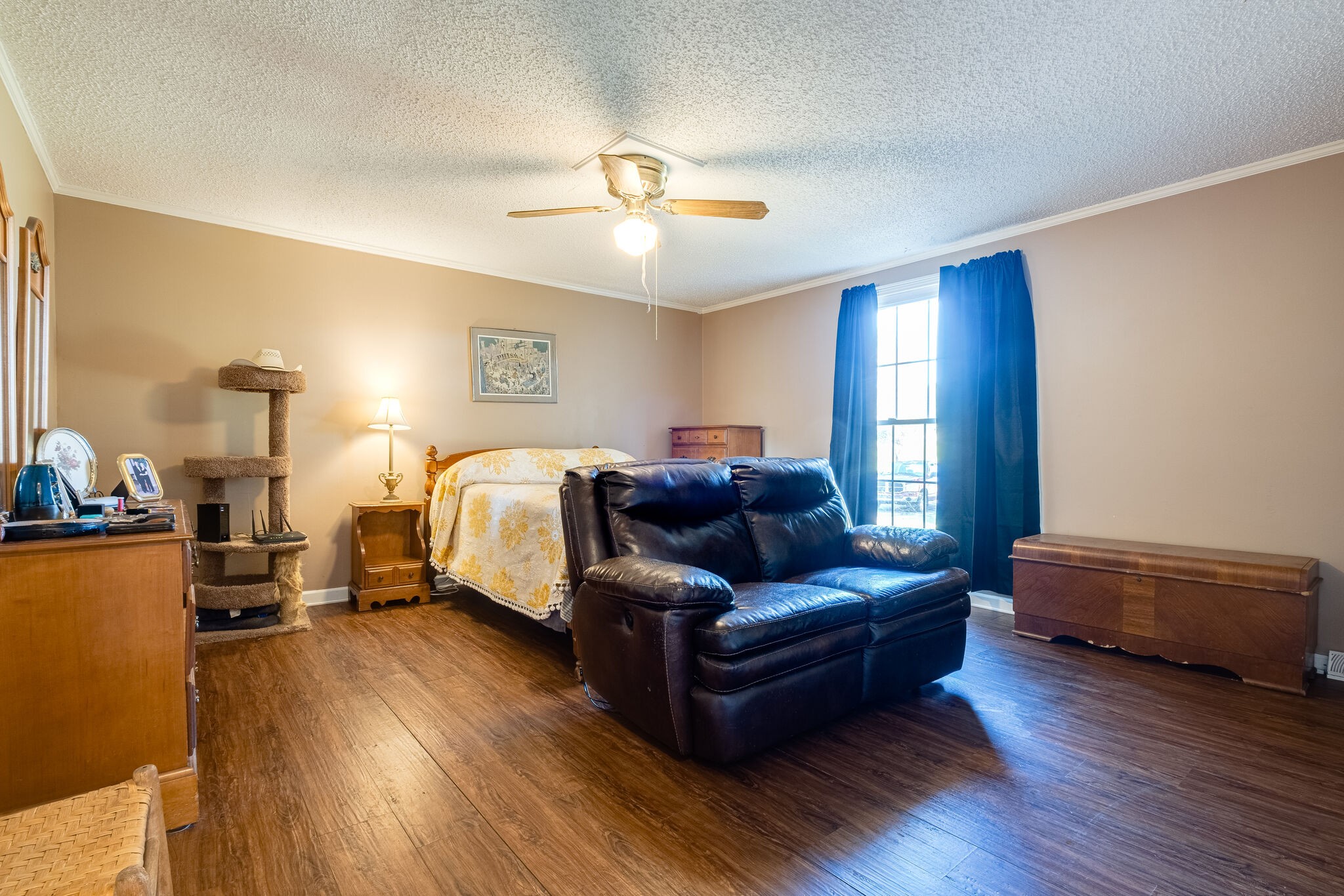 5025 Hickory Ridge Road Lebanon, TN 37087 - Photo 32 of 52 a living room with furniture and a wooden floor