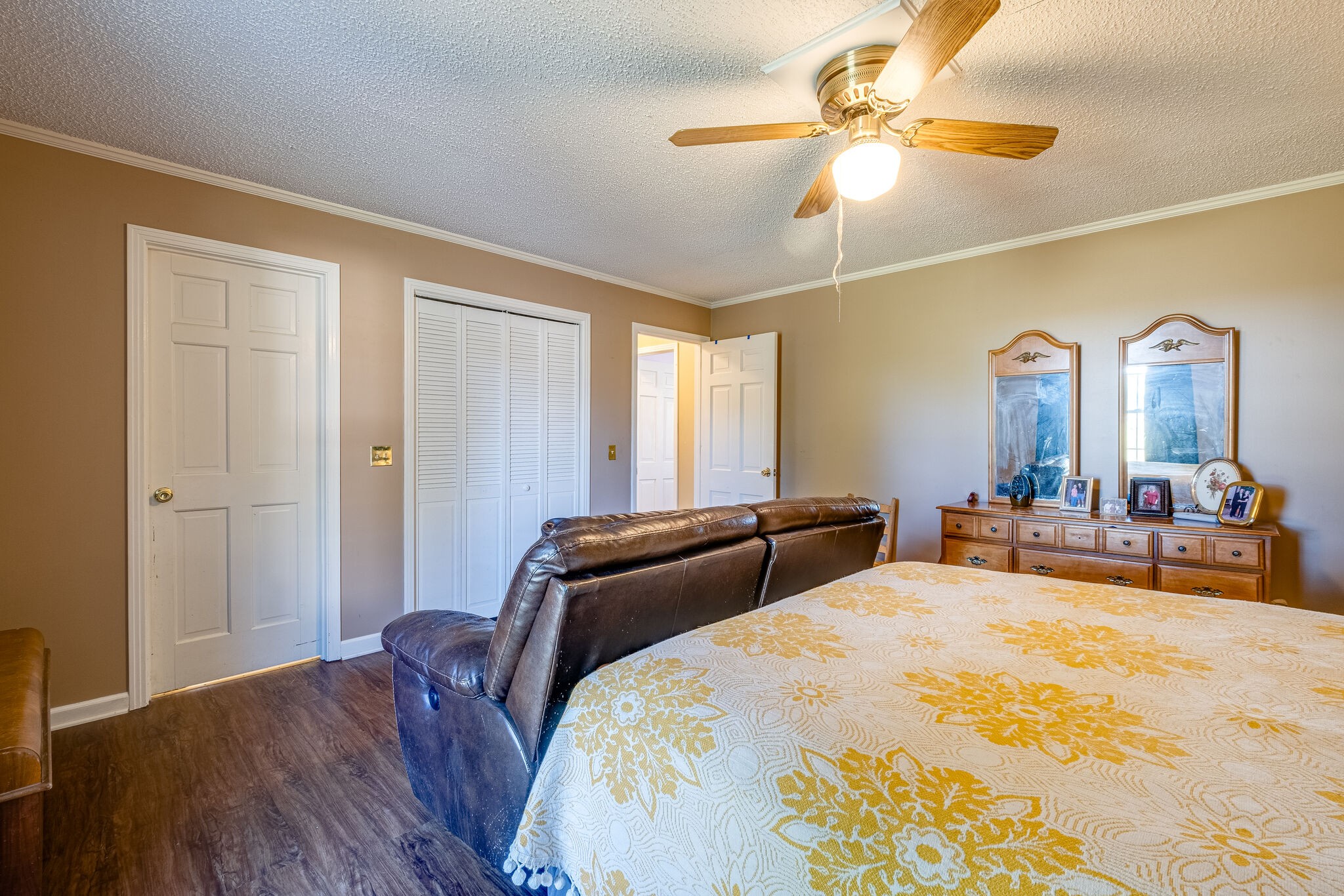 5025 Hickory Ridge Road Lebanon, TN 37087 - Photo 33 of 52 a bedroom with bed and a chandelier