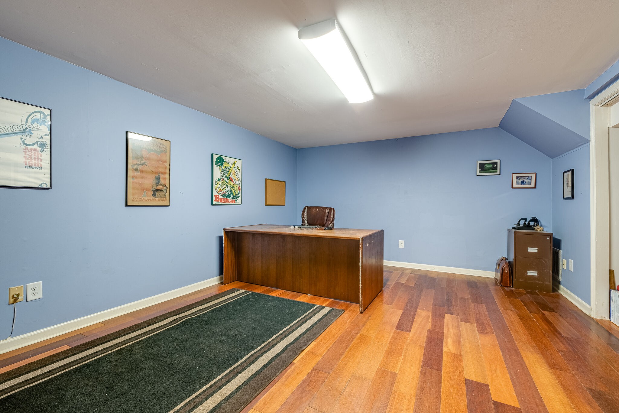 5025 Hickory Ridge Road Lebanon, TN 37087 - Photo 34 of 52 a bedroom with a bed and wooden floor