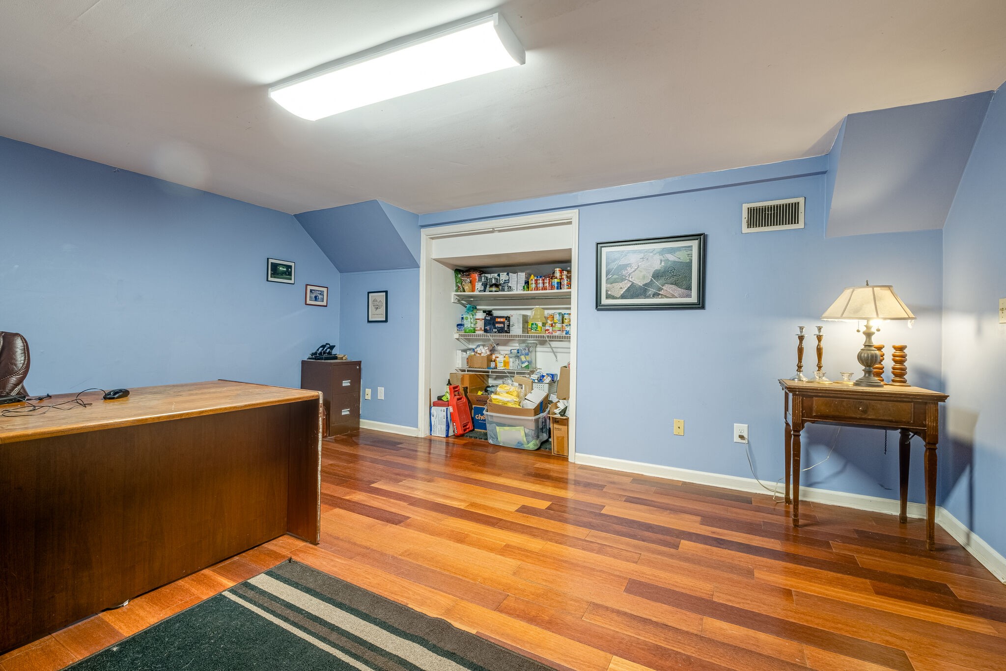5025 Hickory Ridge Road Lebanon, TN 37087 - Photo 35 of 52 a living room with furniture and a wooden floor