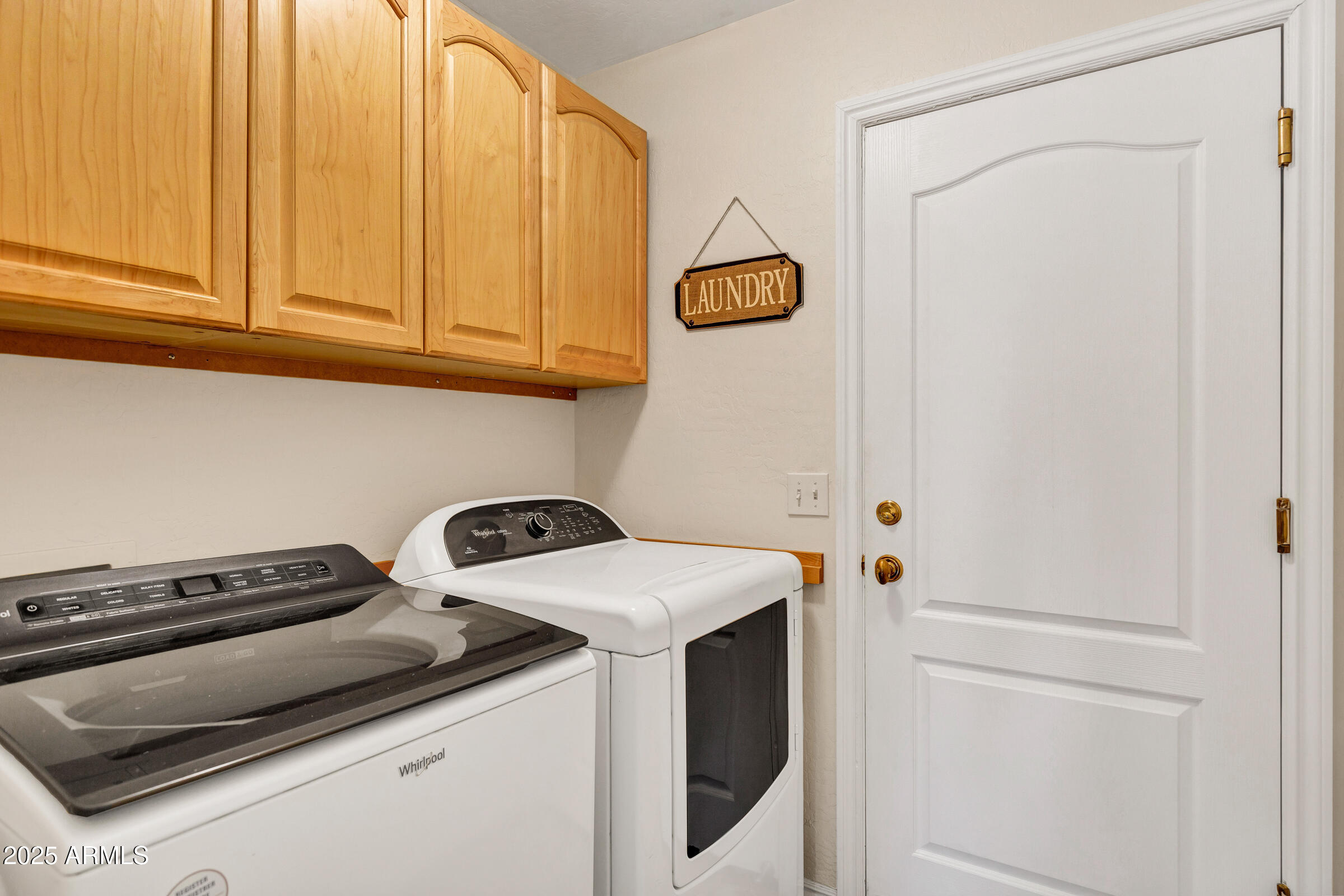 2864 East Pony Court Gilbert, AZ 85295 - Photo 17 of 20 a utility room with dryer and washer
