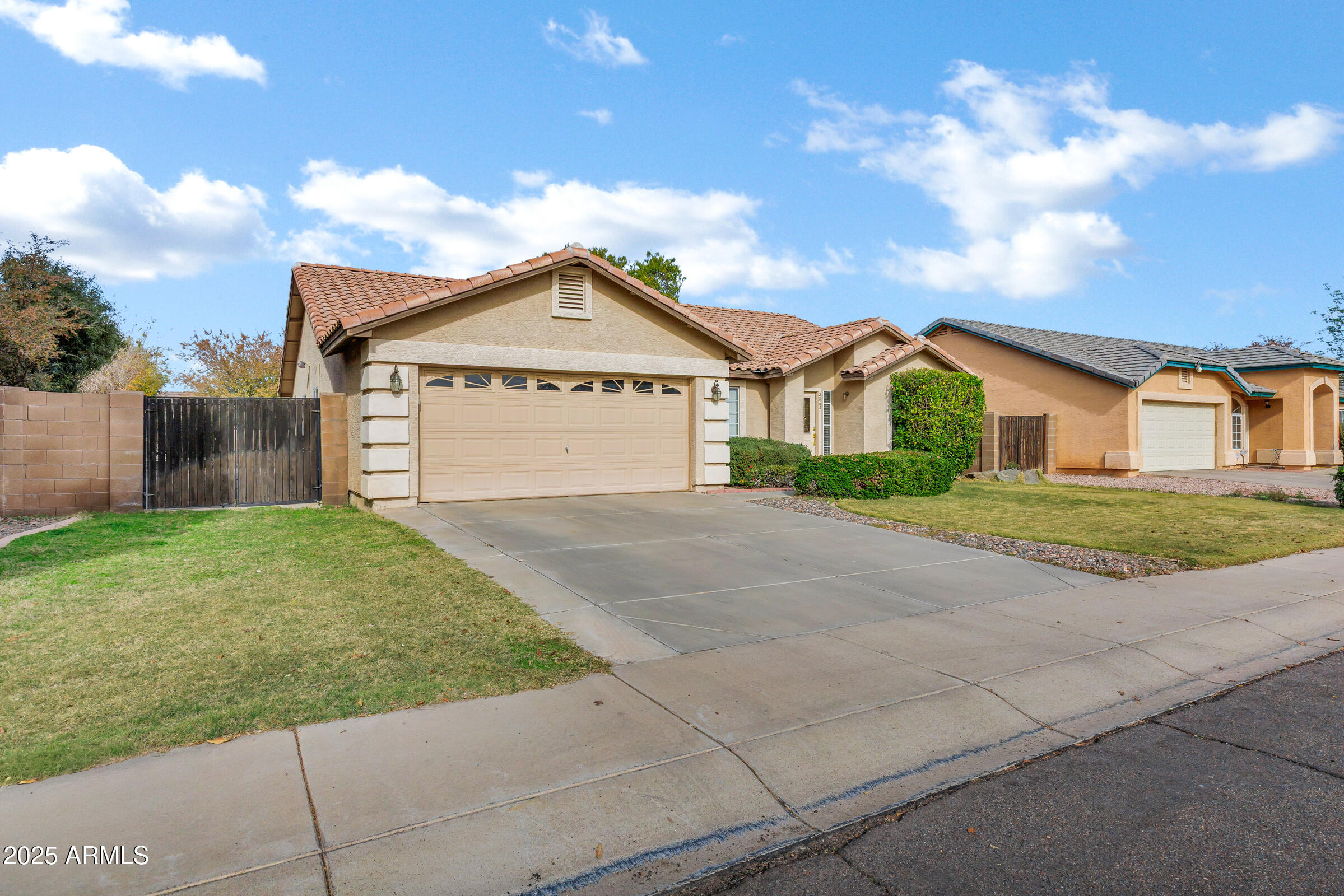 2864 East Pony Court Gilbert, AZ 85295 - Photo 2 of 20 a view of outdoor space yard and front view of a house