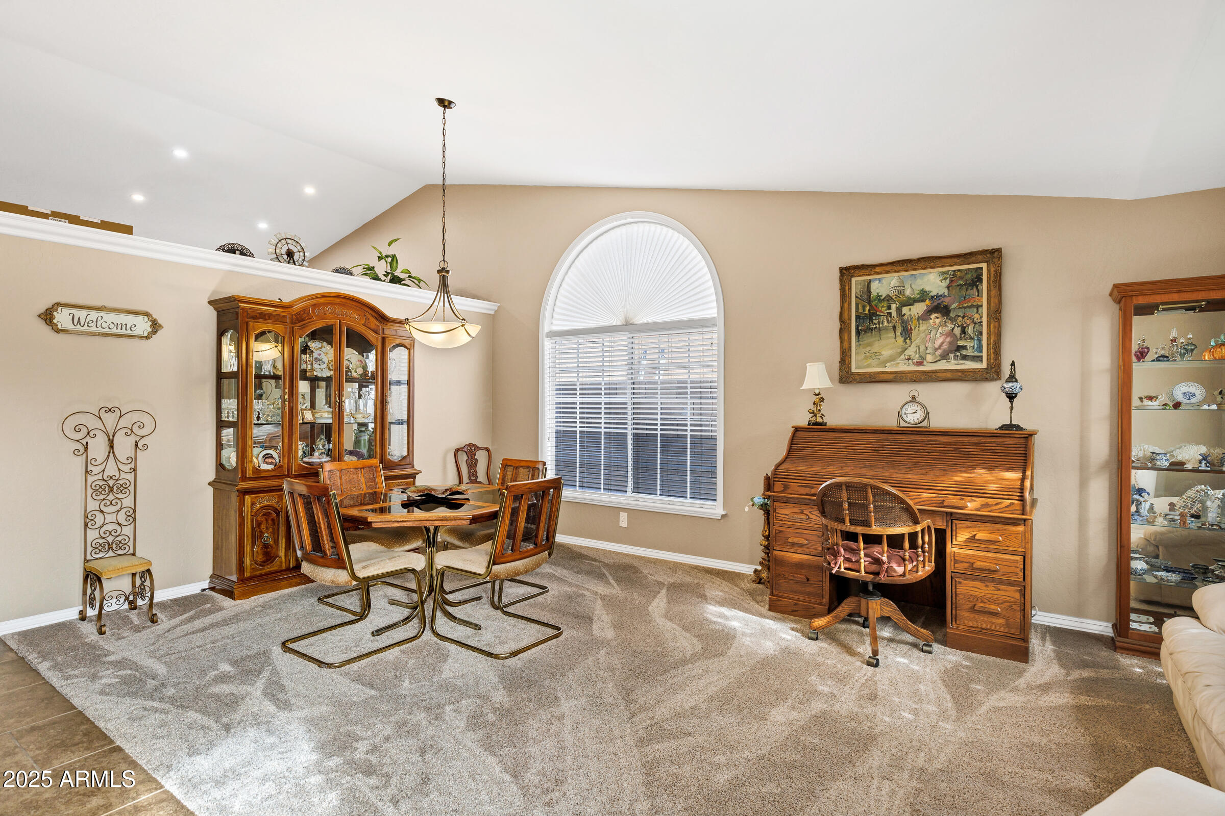 2864 East Pony Court Gilbert, AZ 85295 - Photo 5 of 20 a living room with furniture a couch and a chandelier