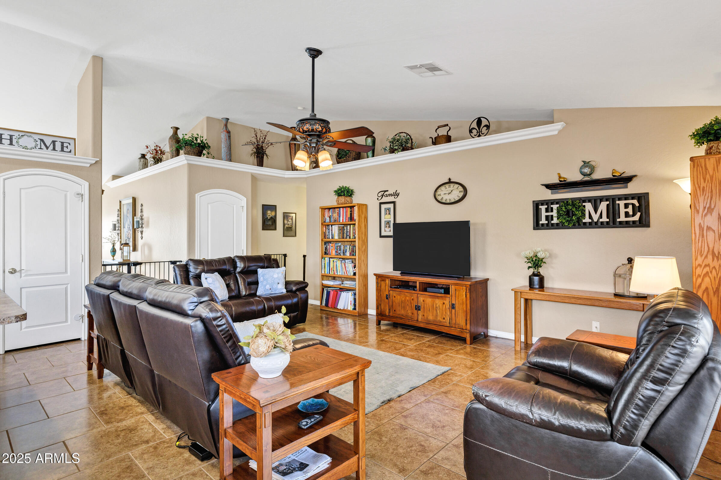 2864 East Pony Court Gilbert, AZ 85295 - Photo 6 of 20 a living room with furniture and wooden floor