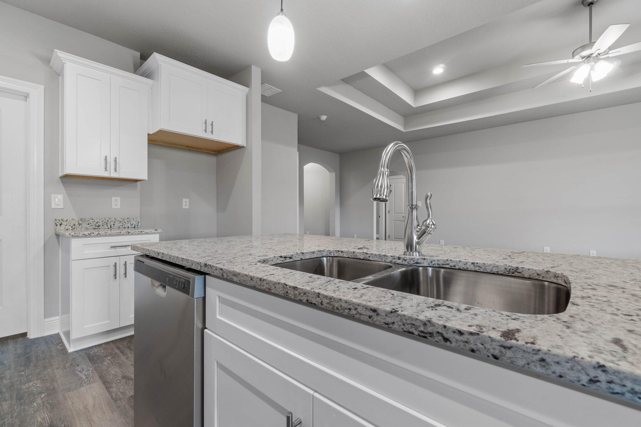 9158 Trident Road Milton, FL 32583 - Photo 17 of 41 a kitchen with a sink and cabinets