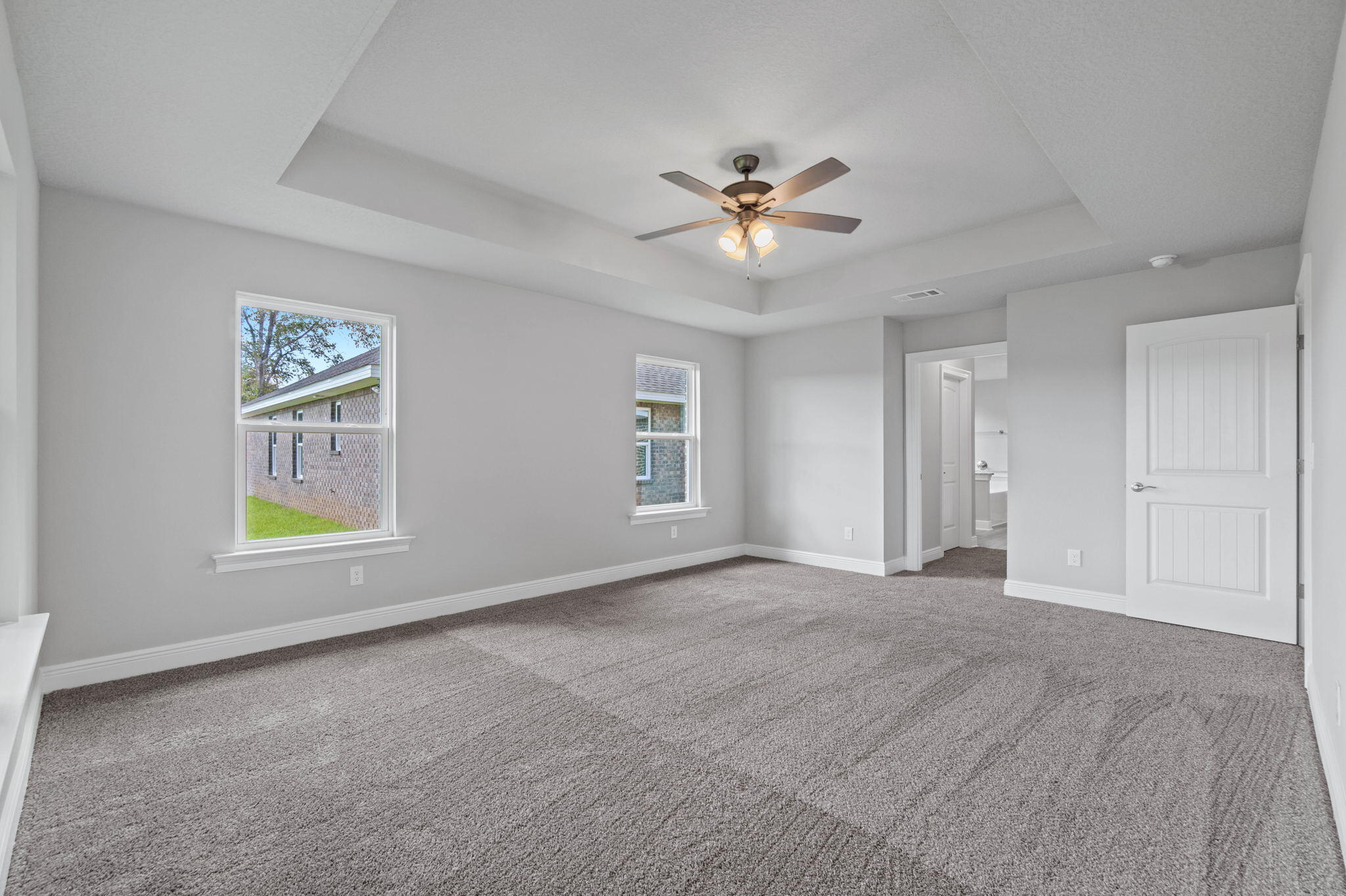 9158 Trident Road Milton, FL 32583 - Photo 21 of 41 a view of an empty room with a window