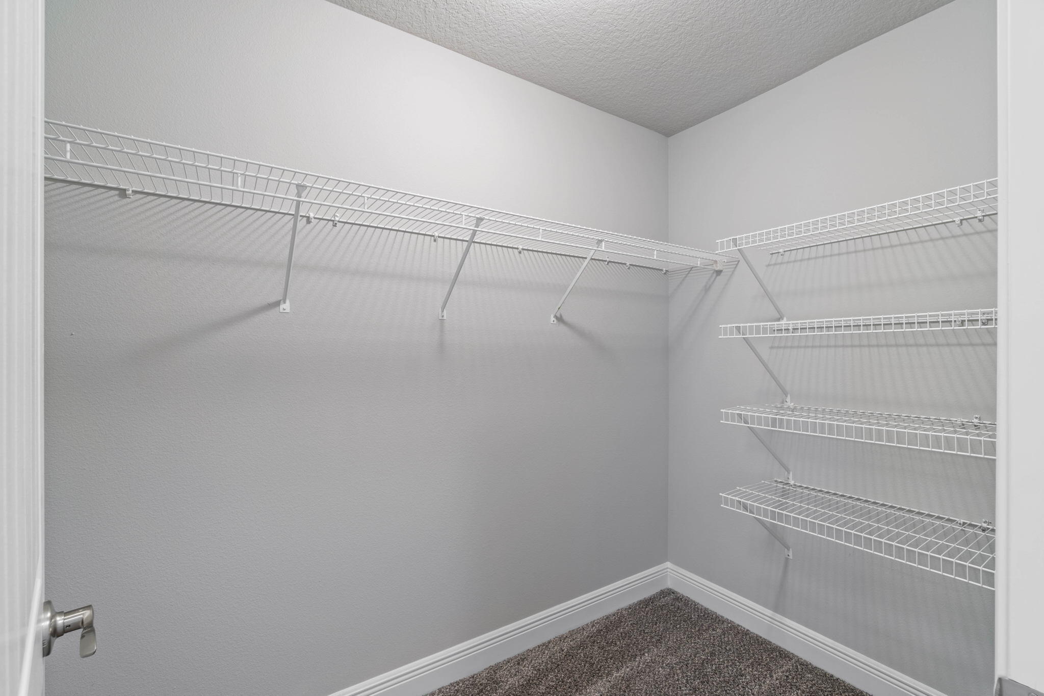 9158 Trident Road Milton, FL 32583 - Photo 23 of 41 a view of an empty walk in closet