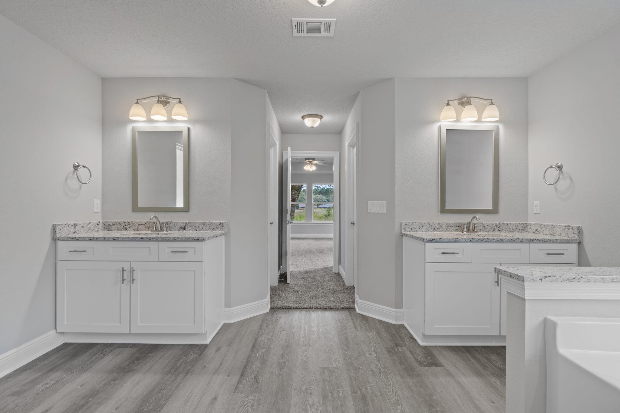 9158 Trident Road Milton, FL 32583 - Photo 25 of 41 a bathroom with a sink and a mirror