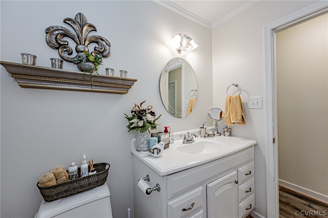 3902 Echo Ridge Court Midlothian, VA 23112 - Photo 14 of 42 a bathroom with a sink mirror and vanity