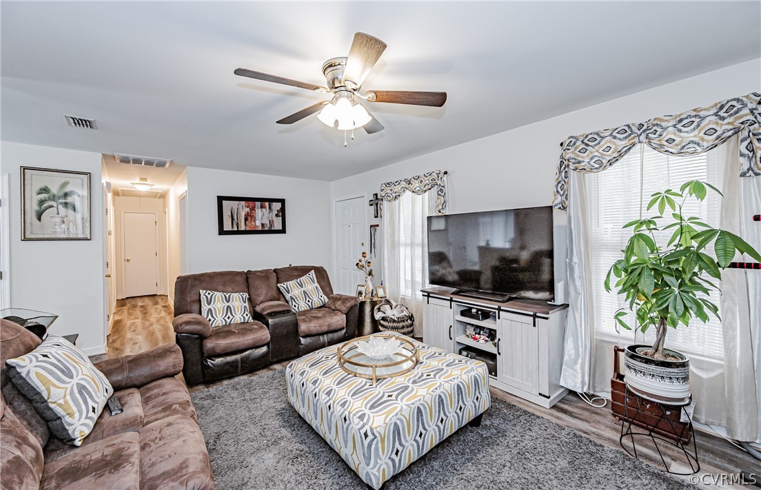 3902 Echo Ridge Court Midlothian, VA 23112 - Photo 27 of 42 a living room with furniture and a flat screen tv