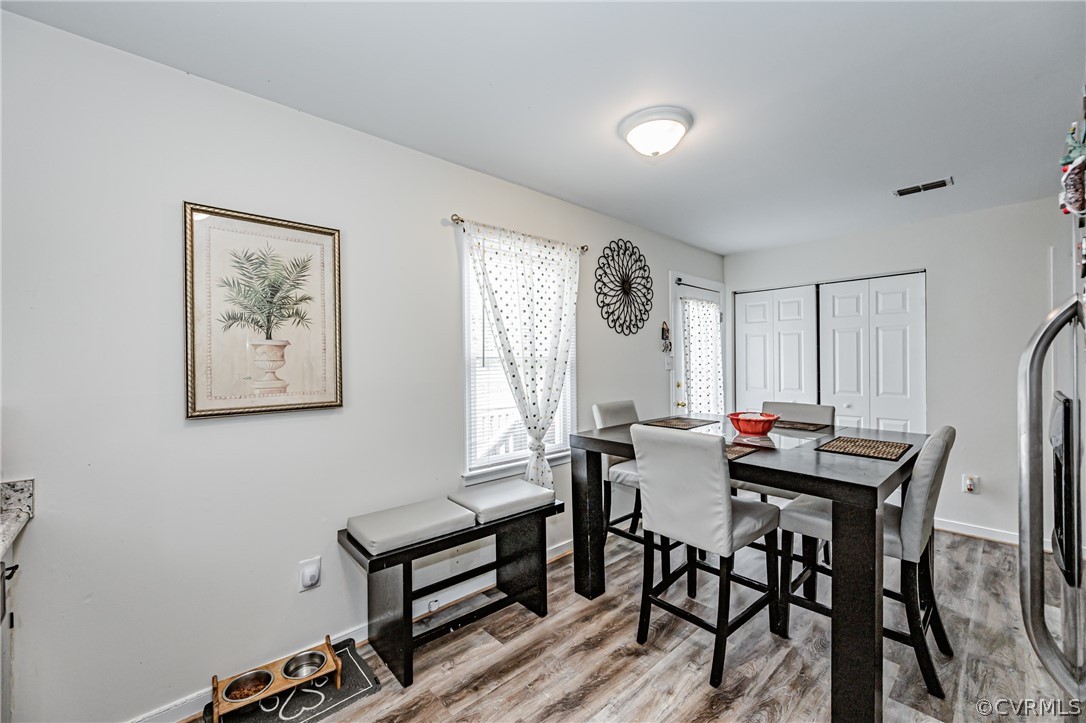 3902 Echo Ridge Court Midlothian, VA 23112 - Photo 36 of 42 a view of a dining room with furniture and window