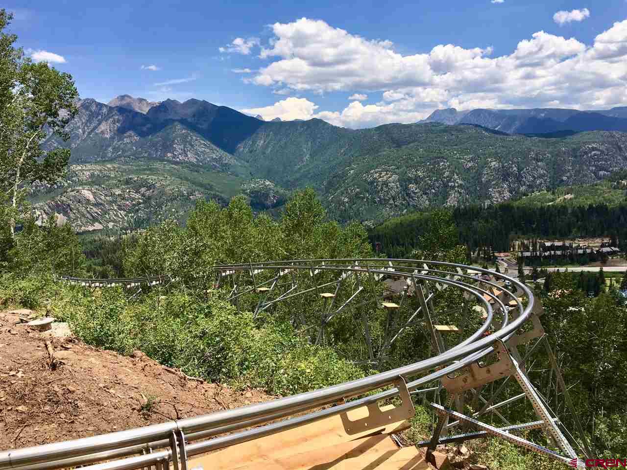 245 Sultan (lot 82) Drive Durango, CO 81301 - Photo 27 of 31 a view of a lake from a balcony
