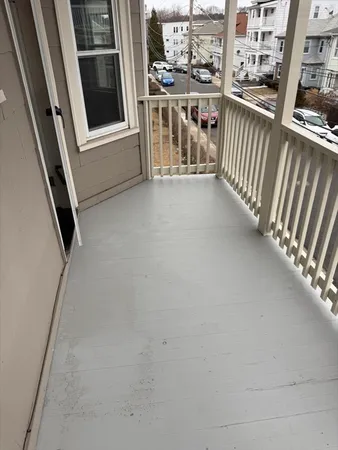 a view of a balcony with an outdoor space