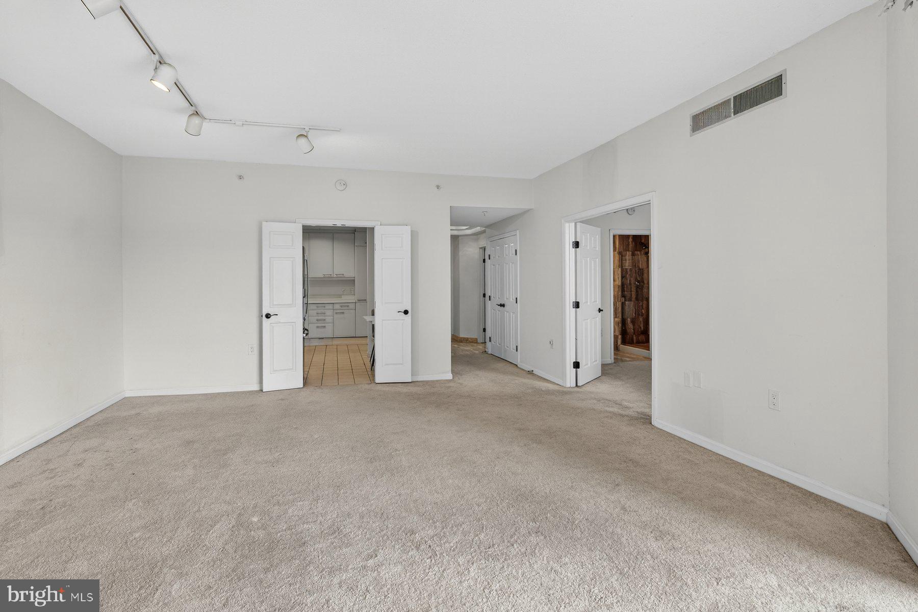 3801 Canterbury Road, Unit 403 Baltimore, MD 21218 - Photo 8 of 25 Spacious, versatile living area awaits.