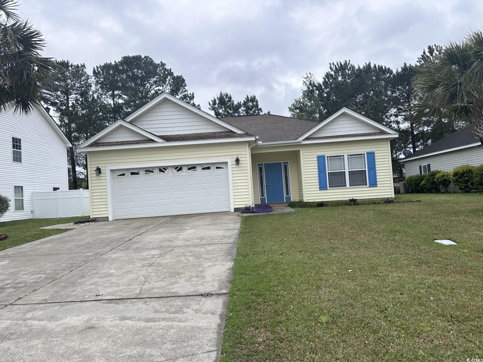 160 Molinia Drive Murrells Inlet, SC 29576 - Photo 1 of 7 Ranch-style house featuring concrete driveway, a garage, and roof with shingles