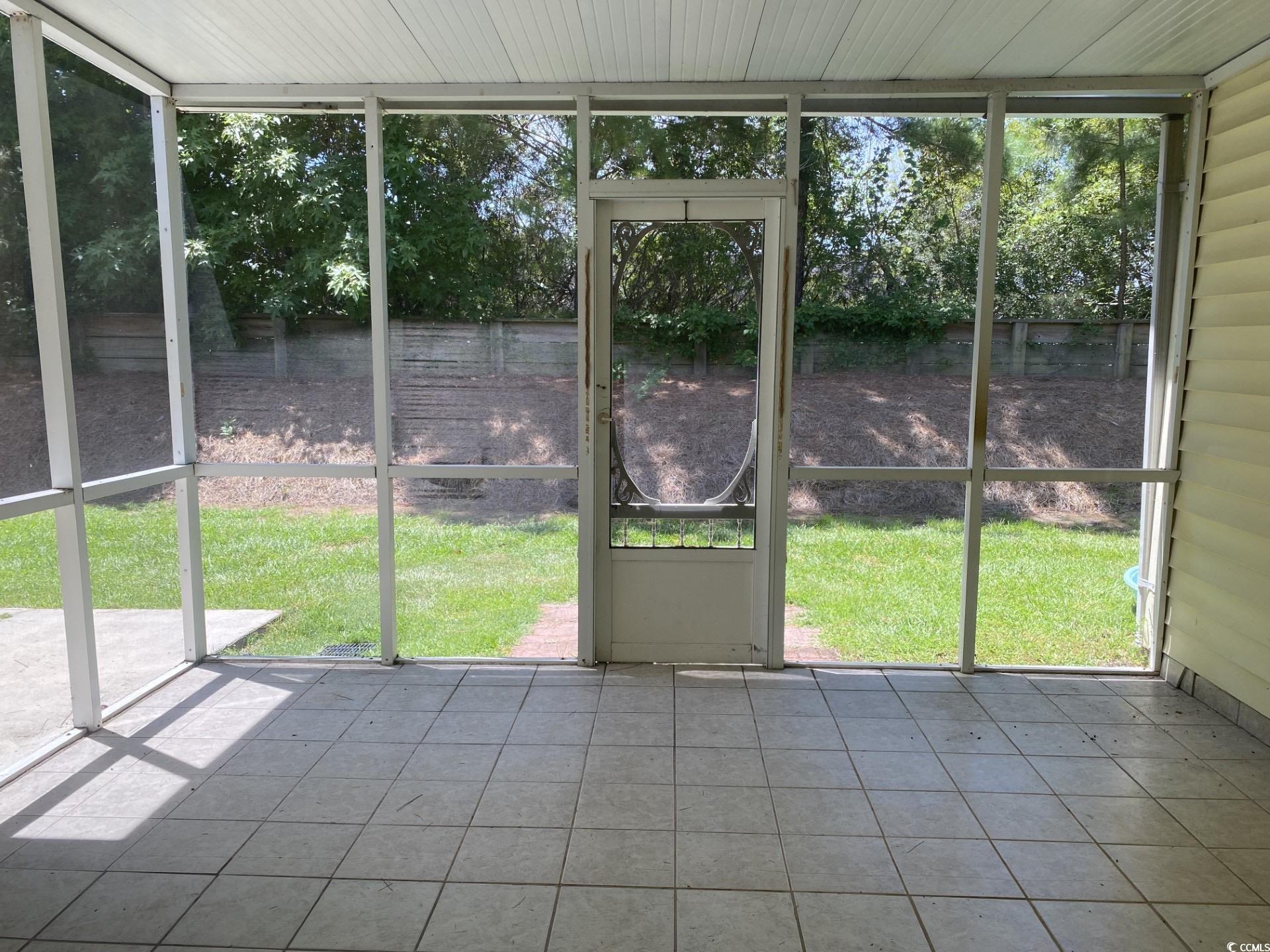 160 Molinia Drive Murrells Inlet, SC 29576 - Photo 7 of 7 Unfurnished sunroom with plenty of natural light
