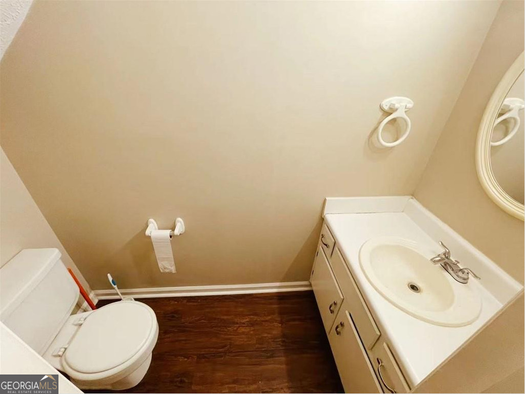 1857 Grant Court Kennesaw, GA 30144 - Photo 7 of 14 a bathroom with a sink and a toilet