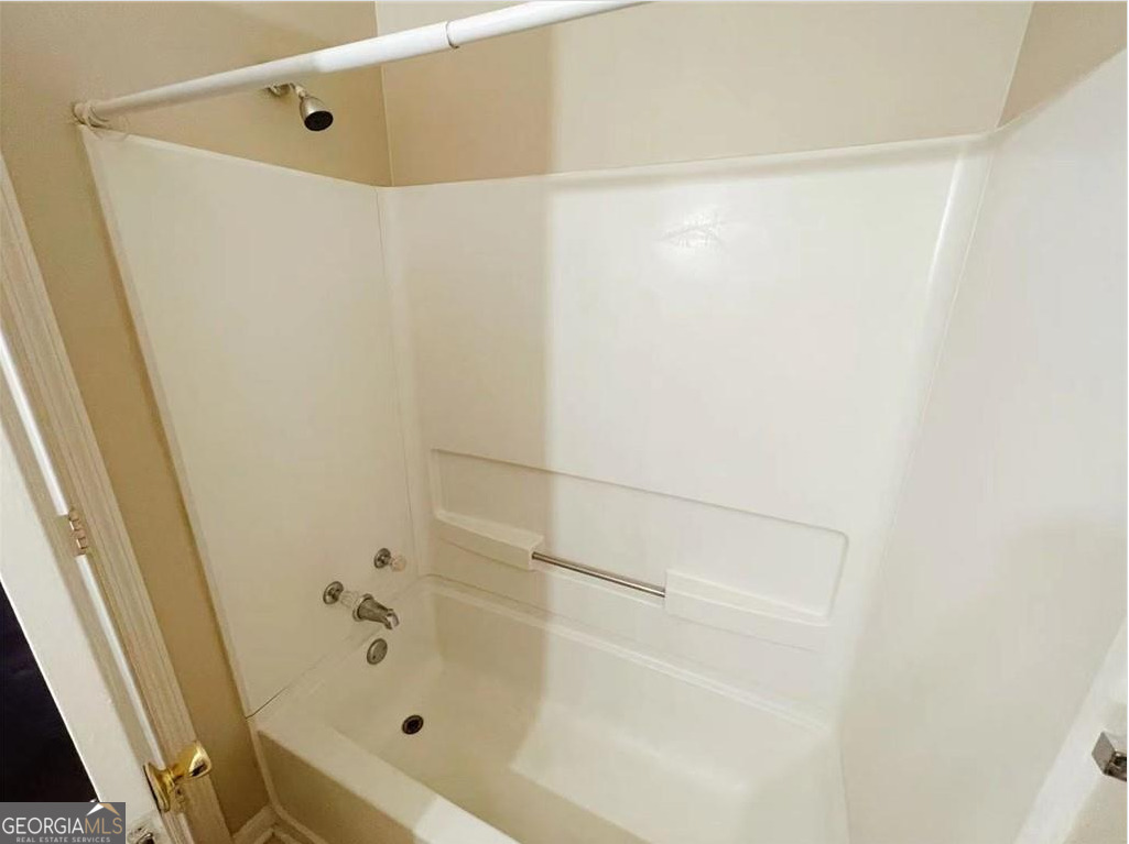 1857 Grant Court Kennesaw, GA 30144 - Photo 10 of 14 a bathroom with a shower