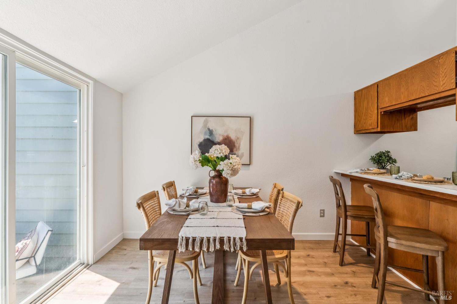 230 Courtyards East Windsor, CA 95492 - Photo 3 of 22 a view of a dining room with furniture and wooden floor