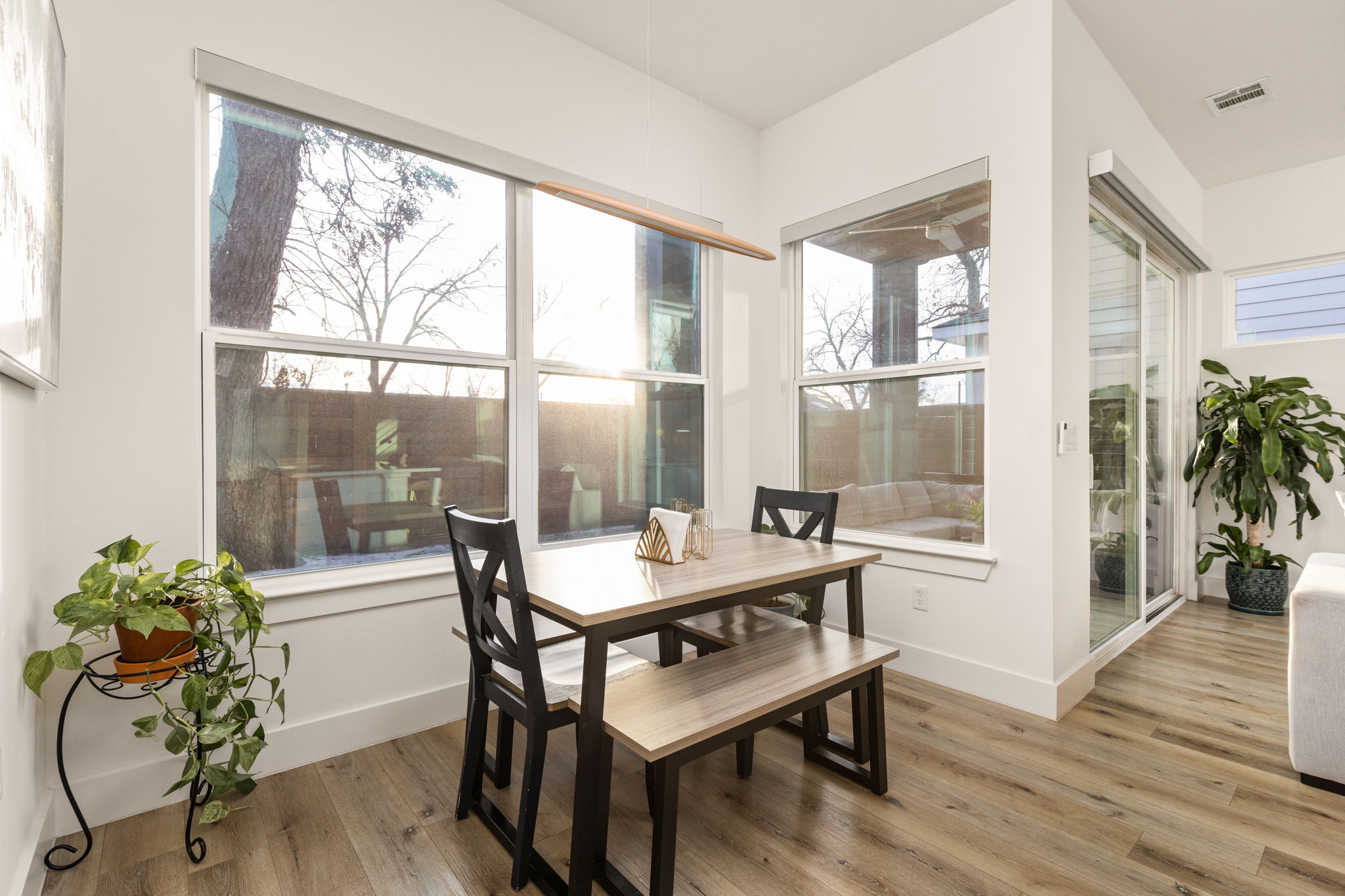 5109 Glissman Road, Unit 1 Austin, TX 78702 - Photo 10 of 39 a living room with furniture and a potted plant