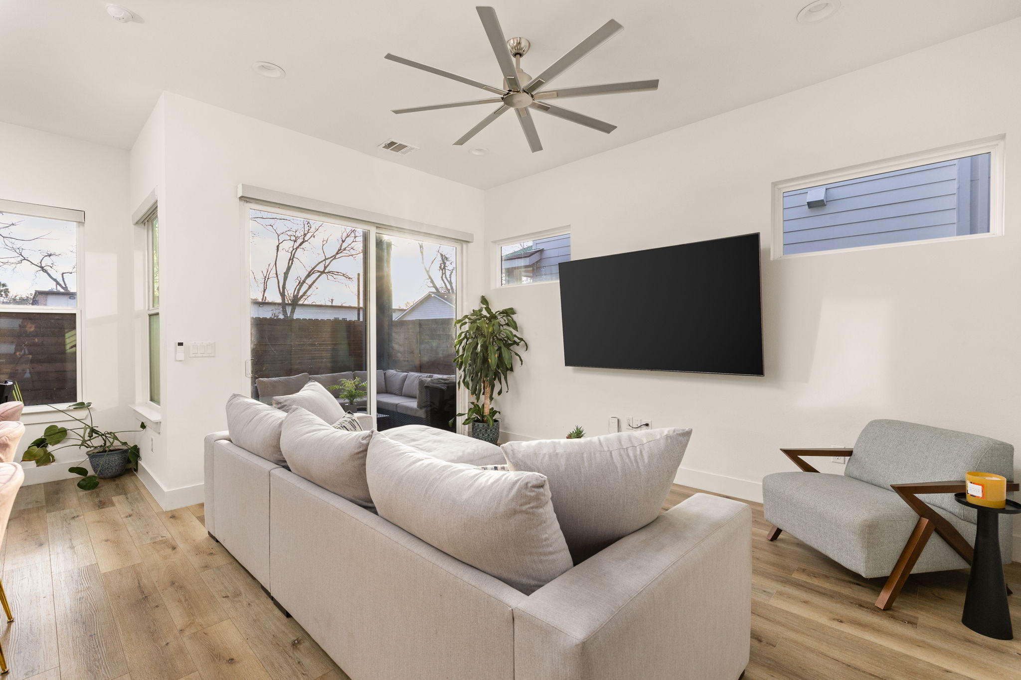 5109 Glissman Road, Unit 1 Austin, TX 78702 - Photo 11 of 39 a living room with furniture and a flat screen tv