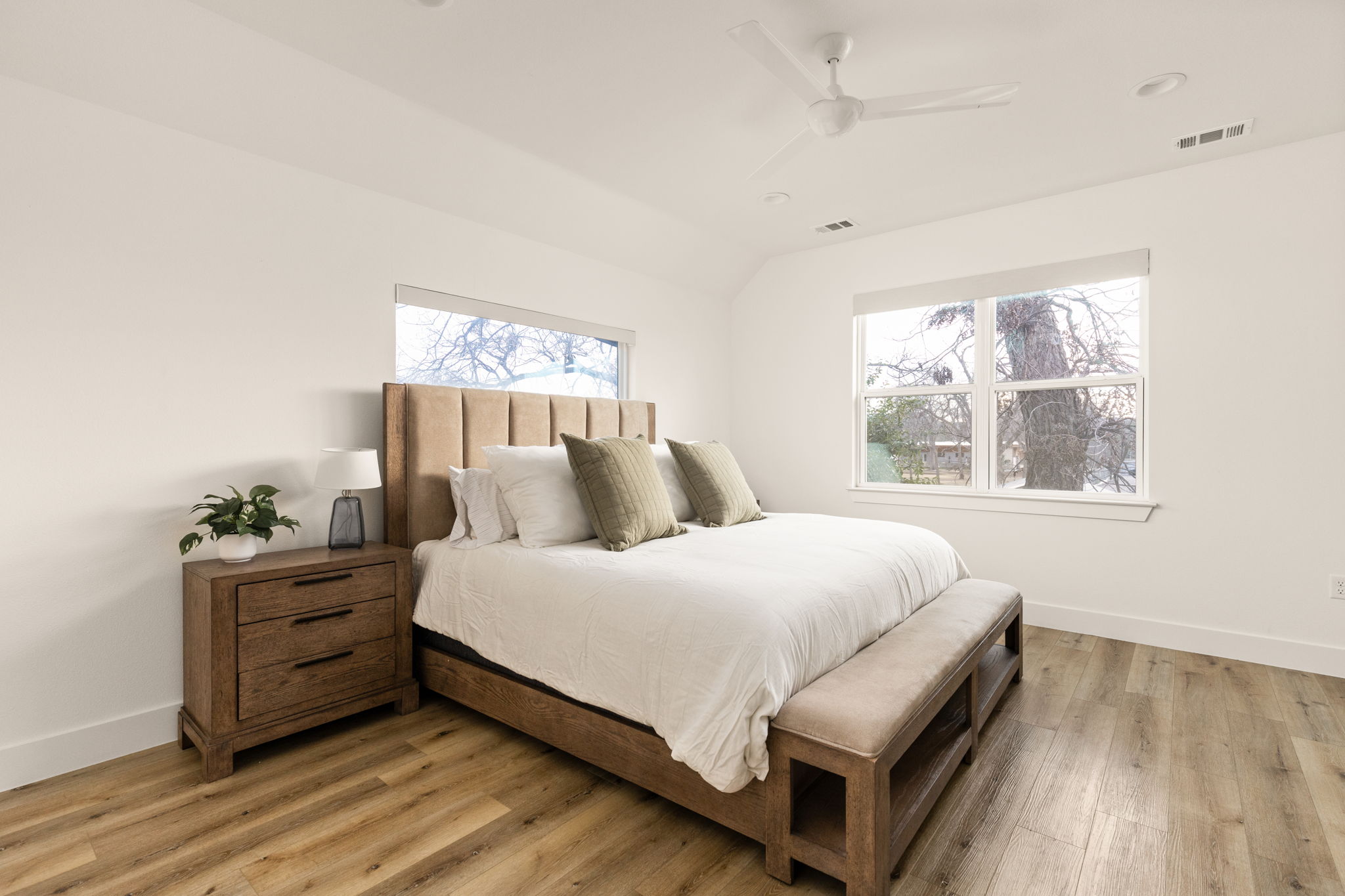5109 Glissman Road, Unit 1 Austin, TX 78702 - Photo 16 of 39 a bed room with a bed and a window
