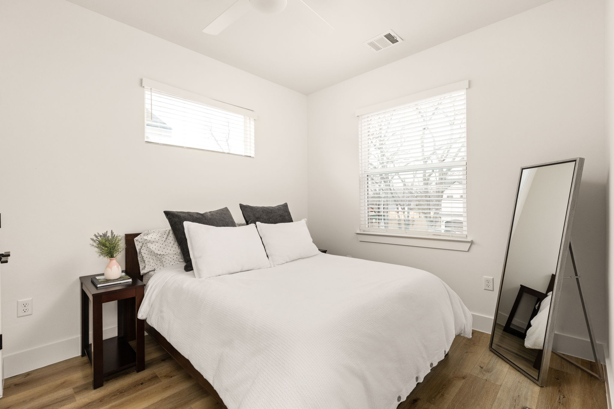 5109 Glissman Road, Unit 1 Austin, TX 78702 - Photo 22 of 39 a bedroom with a bed and a window