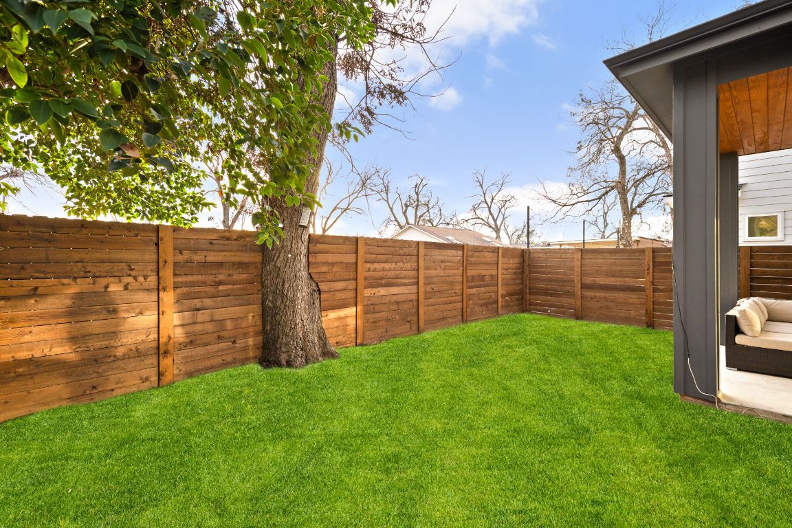 5109 Glissman Road, Unit 1 Austin, TX 78702 - Photo 34 of 39 Backyard - yard has been digitally enhanced for photos
