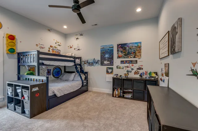 a view of a lake with large trees