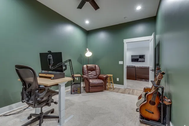 a view of a backyard with a table and chairs