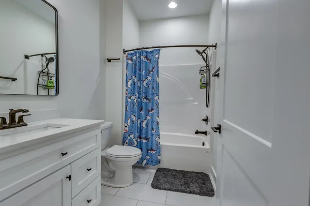 a view of a lake with a yard