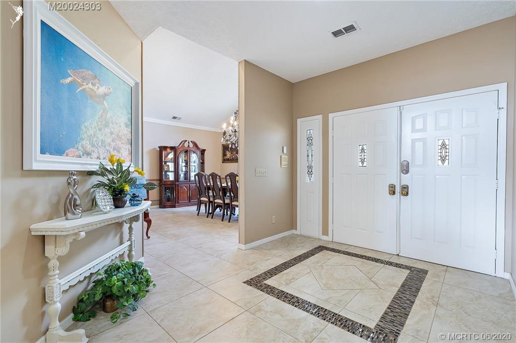46 North River Road Sewall's Point, FL 34996 - Photo 7 of 61 Spacious double door entryway.