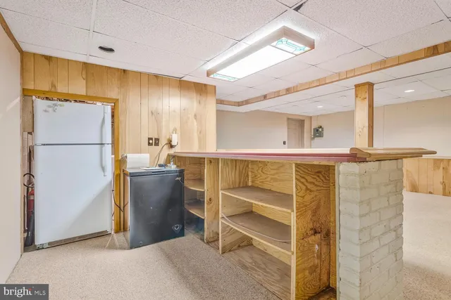 an empty room with wooden floor