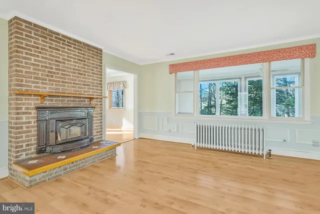 a view of livingroom with furniture and fireplace