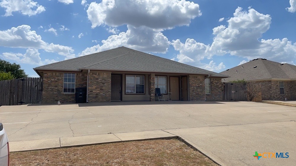4608 Bowles Drive, Unit D Killeen, TX 76549 - Photo 1 of 15 a front view of a house with yard