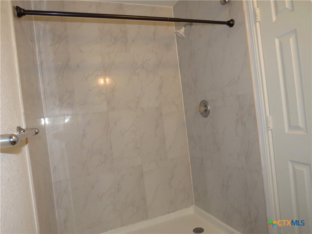 4608 Bowles Drive, Unit D Killeen, TX 76549 - Photo 11 of 15 a bathroom with a shower