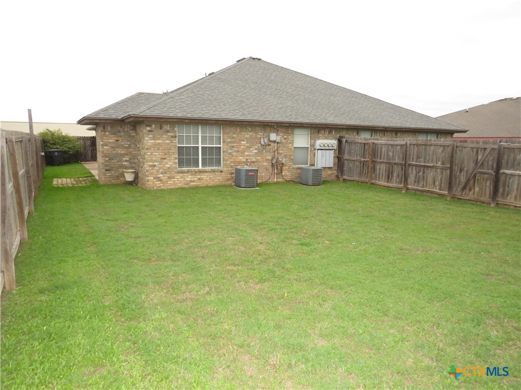 4608 Bowles Drive, Unit D Killeen, TX 76549 - Photo 15 of 15 a view of a house with backyard and garden
