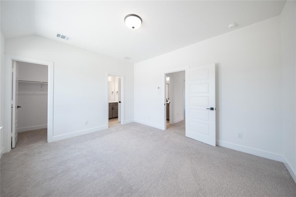 2719 Triumph Court Heath, TX 75126 - Photo 11 of 39 a view of an empty room
