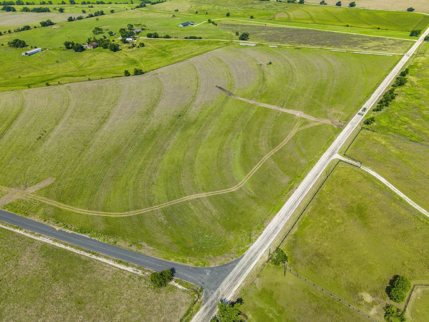 1 County Road 327 Road Granger, TX 76530 - Photo 14 of 27 Vast green pastures and rolling acreage stretch across this sprawling countryside property.