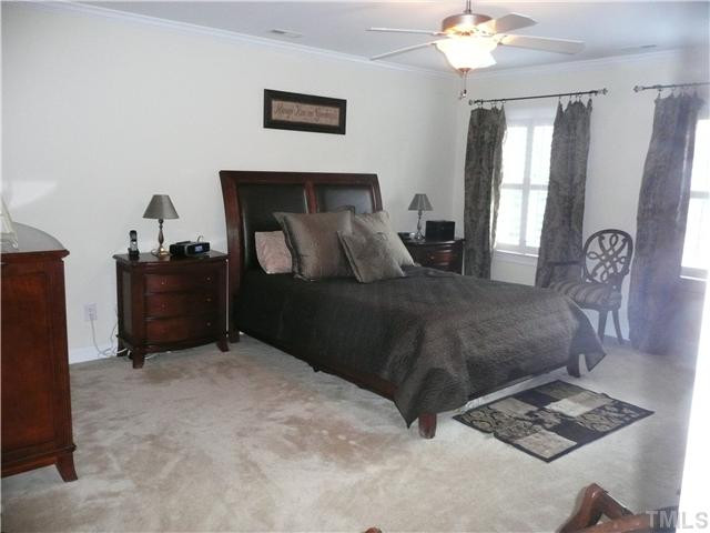 12501 Amoretto Way Raleigh, NC 27613 - Photo 10 of 23 Master boasts large dimensions, sitting area, his and her closets. Master Suite