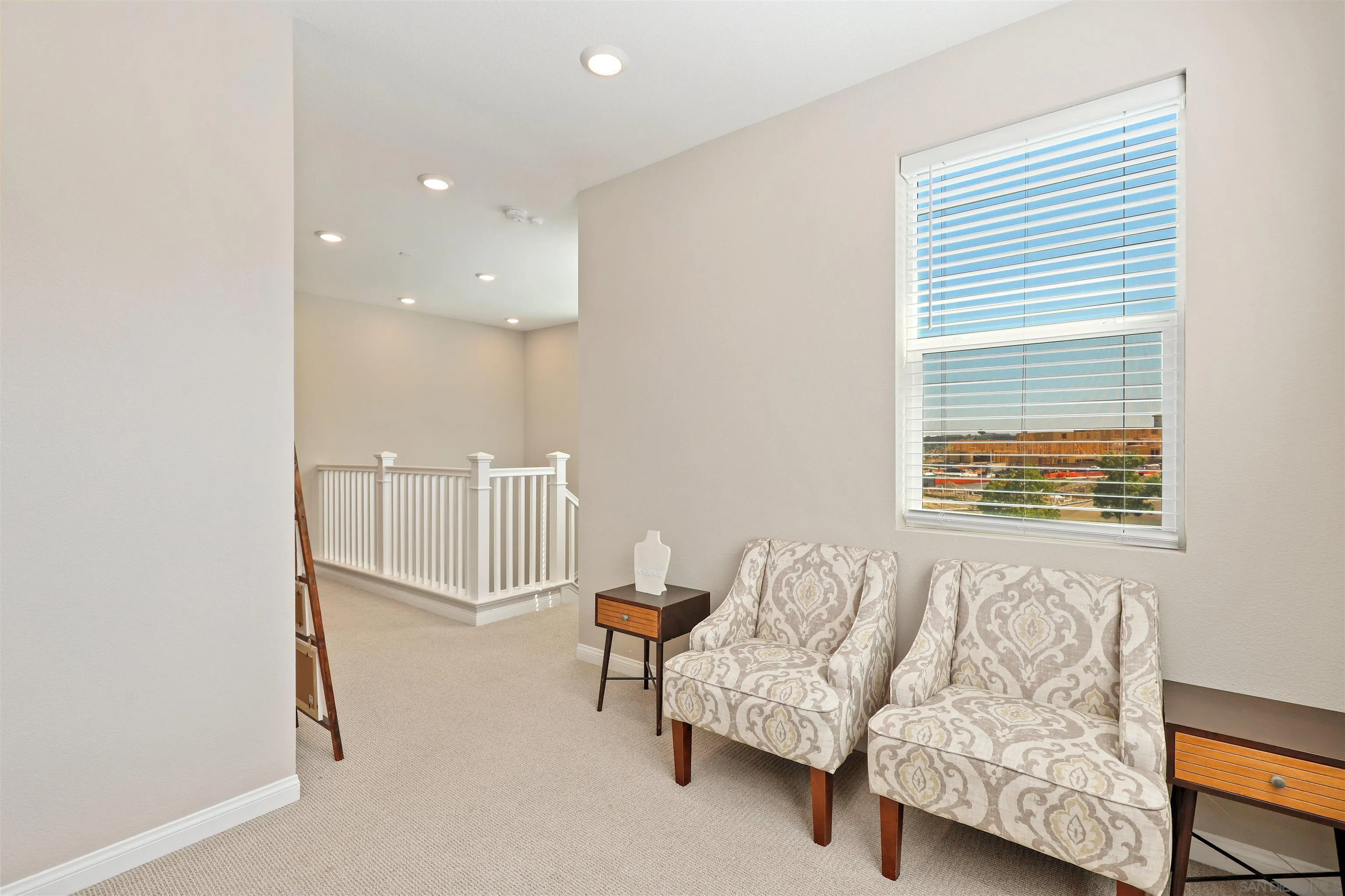 1799 Whitmore Loop Chula Vista, CA 91913 - Photo 13 of 36 a living room with furniture and a window