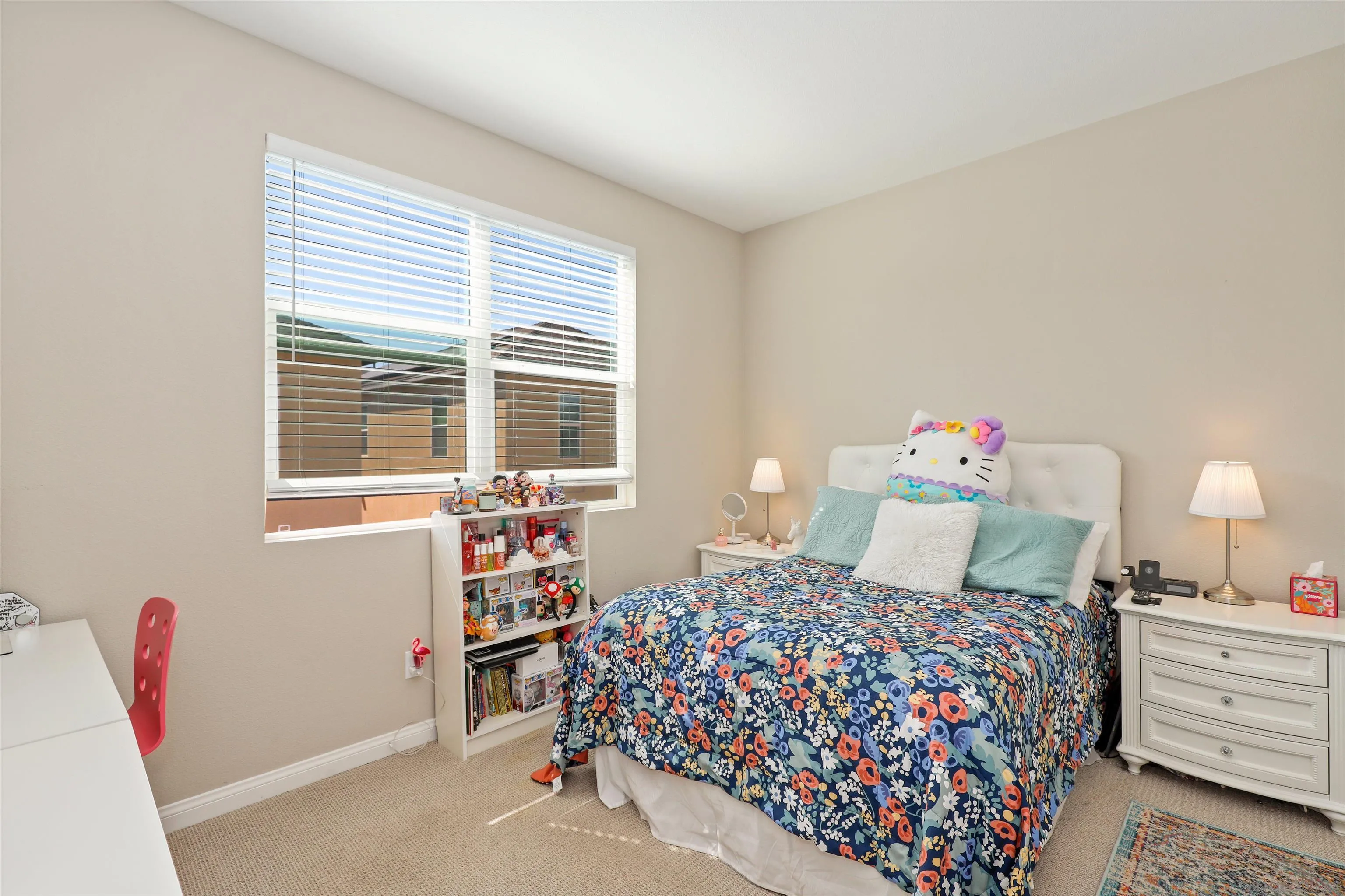 1799 Whitmore Loop Chula Vista, CA 91913 - Photo 16 of 36 a bedroom with a bed and a window