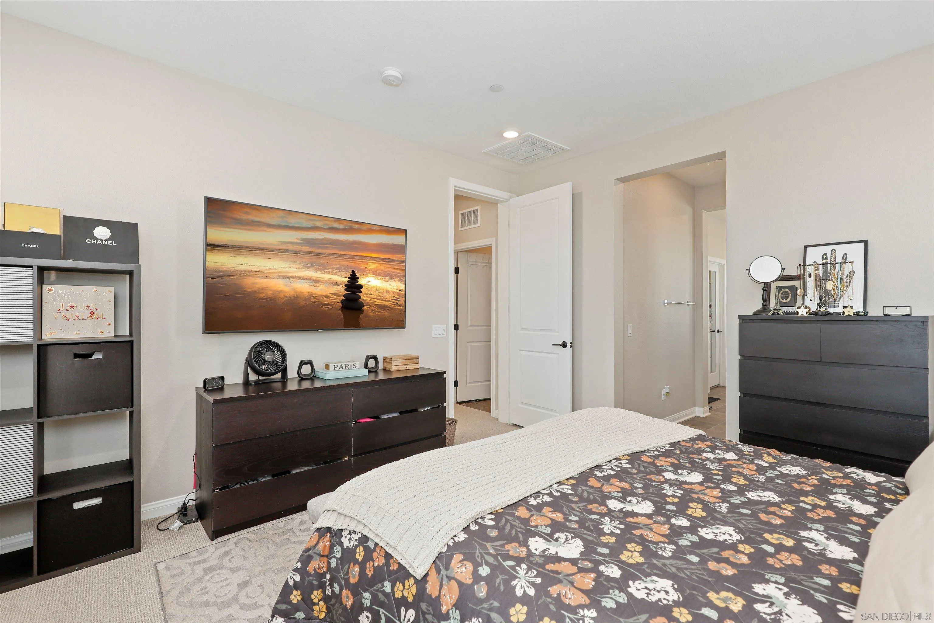 1799 Whitmore Loop Chula Vista, CA 91913 - Photo 21 of 36 a bedroom with a bed and a flat screen tv