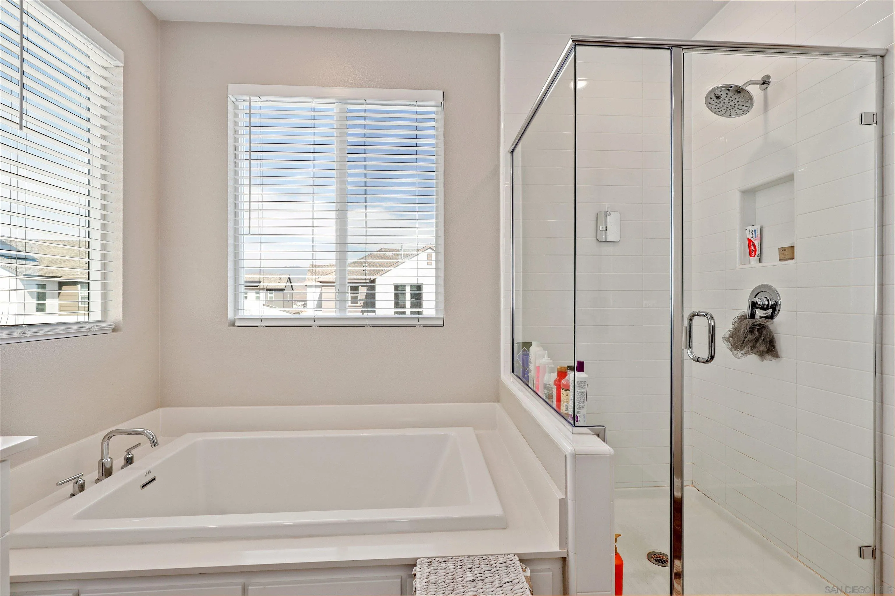 1799 Whitmore Loop Chula Vista, CA 91913 - Photo 23 of 36 a white bath tub sitting next to a shower