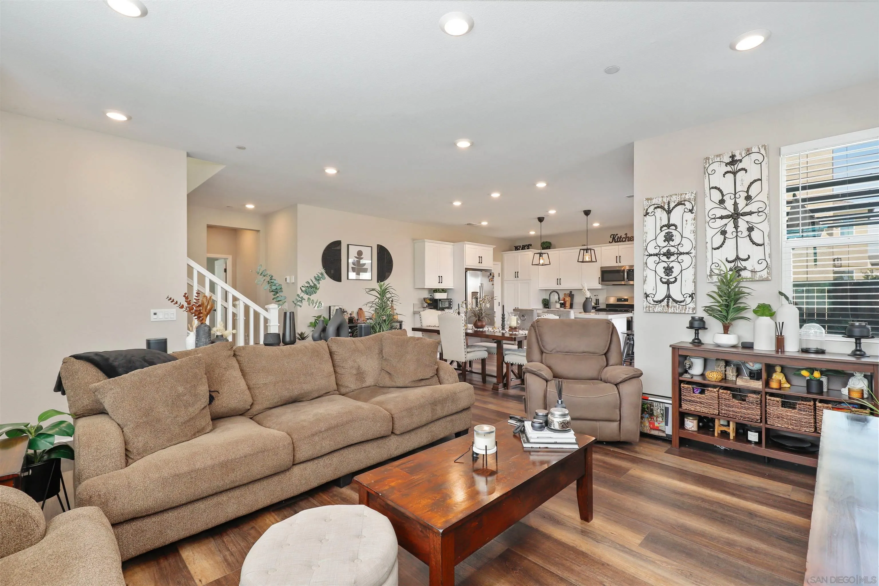 1799 Whitmore Loop Chula Vista, CA 91913 - Photo 4 of 36 a living room with furniture kitchen view and a table