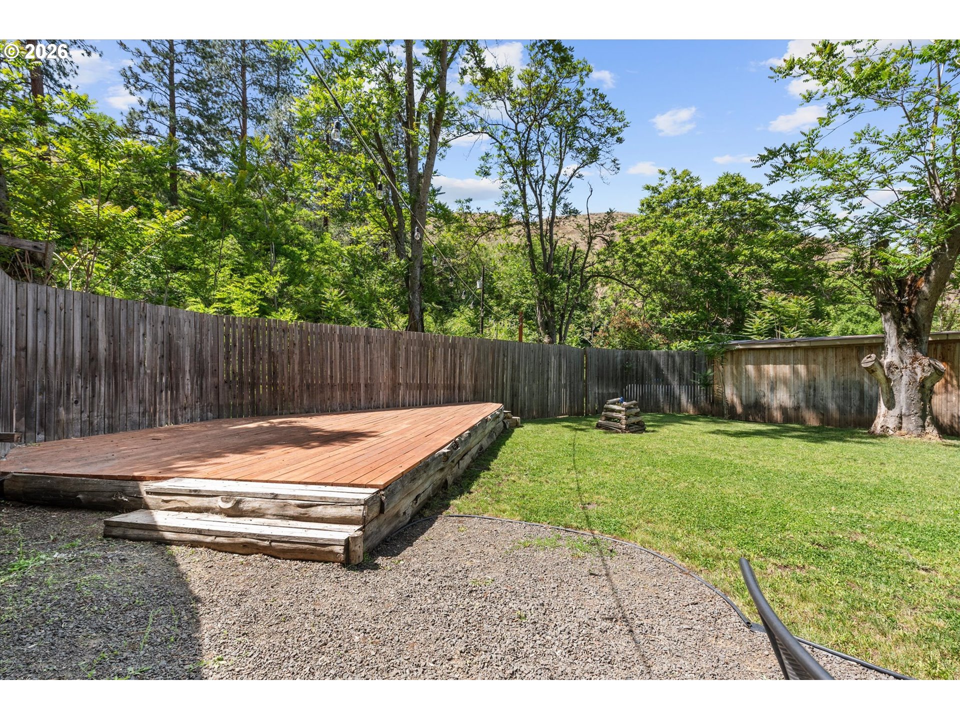 53945 Highway 86 Halfway, OR 97834 - Photo 29 of 48 a backyard of a house with table and chairs