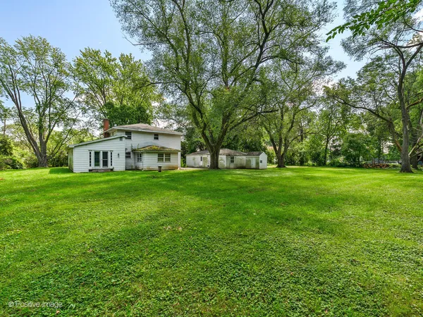 a house view with a garden space