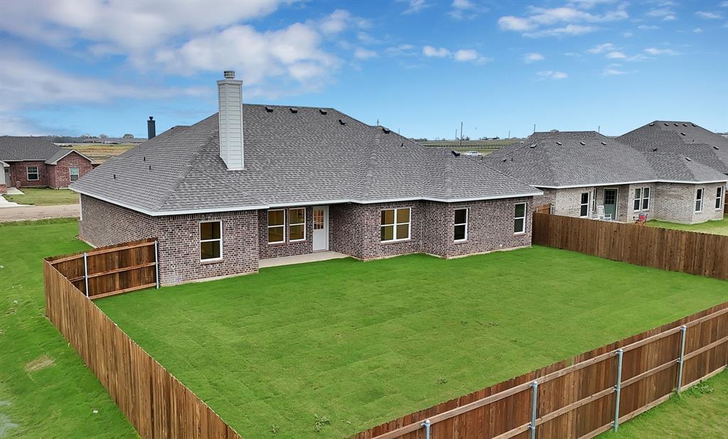 106 Panther Loop Mabank, TX 75147 - Photo 2 of 34 a house view with a garden space